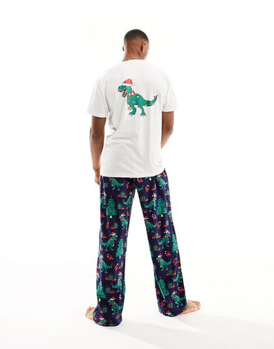 Ensemble de pyjama à imprimé dinosaures style Noël - Asos Design - Modalova