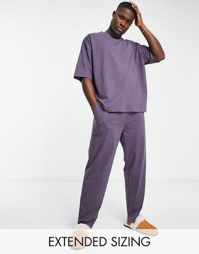 Ensemble de pyjama avec t-shirt oversize et pantalon en jersey - foncé - Asos Design - Modalova