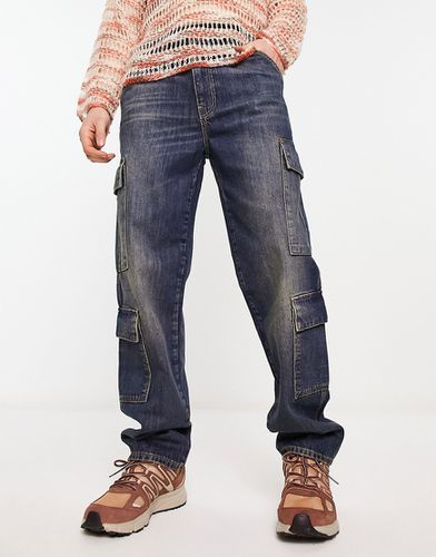 Jean ample à poches cargo - foncé teint - Asos Design - Modalova