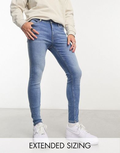 Jean en denim stretch résistant - clair délavé - Asos Design - Modalova