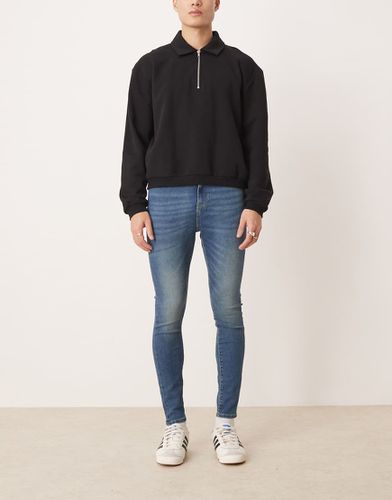 Jean seconde peau - foncé délavé - Asos Design - Modalova