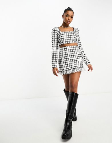 Mini-jupe d'ensemble en bouclé à carreaux et détail frangé - Noir et blanc - Asos Design - Modalova