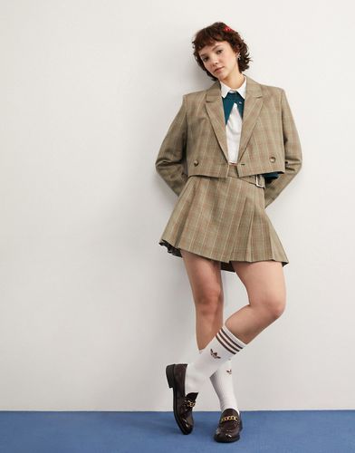 Mini-jupe plissée avec ceinture à boucle - Carreaux marron - Asos Design - Modalova