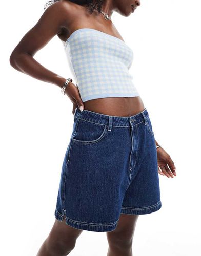 Short en jean avec encoche sur les côtés - Indigo - Asos Design - Modalova