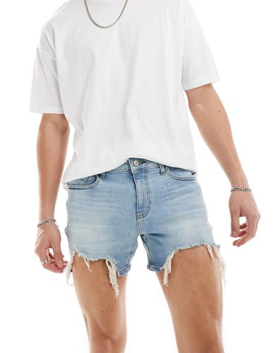 Short en jean court coupe skinny avec ourlet à grosses déchirures - clair délavé - Asos Design - Modalova