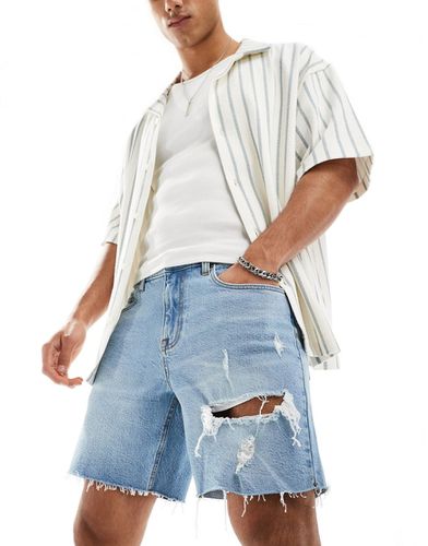 Short en jean mi-long coupe slim à déchirures - clair délavé - Asos Design - Modalova