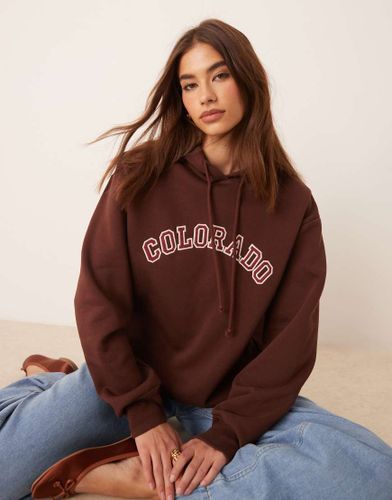 Sweat à capuche oversize avec appliqué ville - Asos Design - Modalova