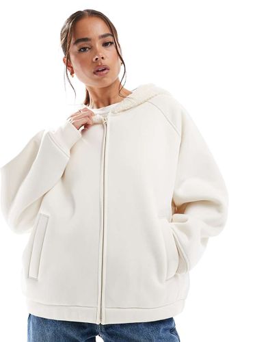 Sweat à capuche en néoprène avec doublure et capuche en imitation peau de mouton - Crème - Asos Design - Modalova