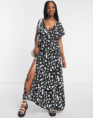 Poitrines généreuses - Robe de plage longue à pois avec manches évasées - Noir et blanc - Asos Design - Modalova