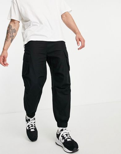 Pantalon cargo fuselé - Asos Design - Modalova