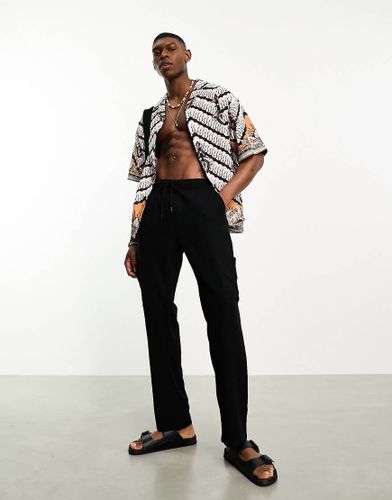 Pantalon cargo slim en lin - Asos Design - Modalova