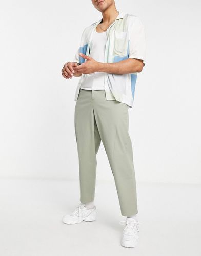 Pantalon chino coupe ballon - clair - Asos Design - Modalova