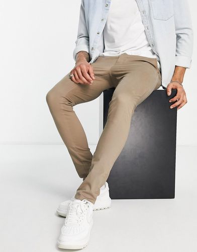 Pantalon chino coupe très ajustée - clair - Asos Design - Modalova
