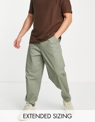 Pantalon chino fuselé oversize - Kaki clair - Asos Design - Modalova