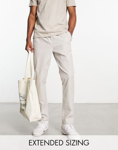 Pantalon chino slim - clair - Asos Design - Modalova