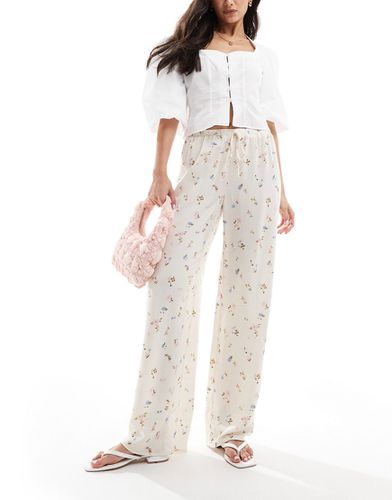 Pantalon ample à enfiler en lin mélangé à petites fleurs - Asos Design - Modalova
