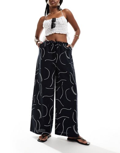 Pantalon ample d'ensemble en lin à imprimé - Monochrome - Asos Design - Modalova