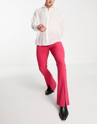 Pantalon ajusté puis évasé à ourlet ultra fendu - framboise - Asos Design - Modalova