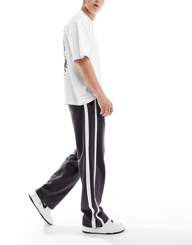 Pantalon de jogging à bandes - Asos Design - Modalova