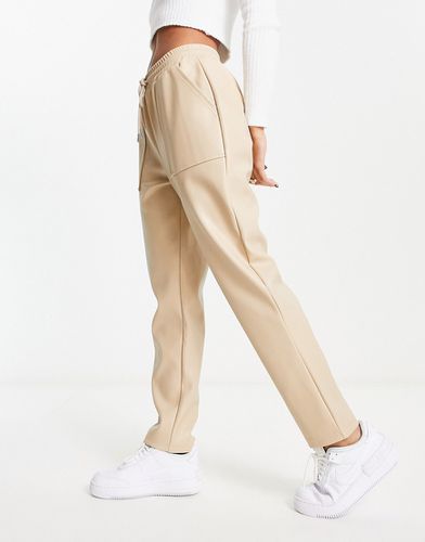 Pantalon de jogging à enfiler en imitation cuir - Champignon - Asos Design - Modalova