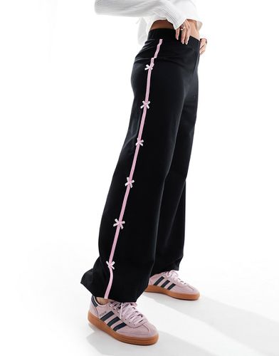 Pantalon de jogging avec bande latérale à nauds - Asos Design - Modalova