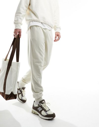Pantalon de jogging fuselé - Beige clair - Asos Design - Modalova