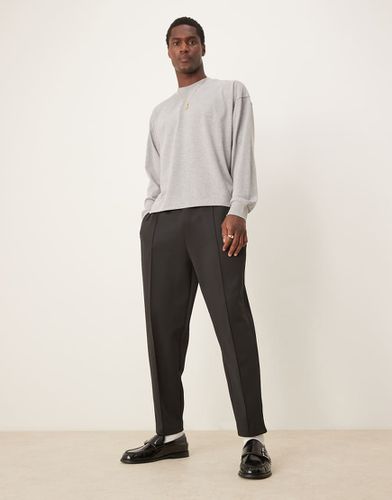 Pantalon de jogging fuselé décontracté en néoprène à plis nervurés - Asos Design - Modalova