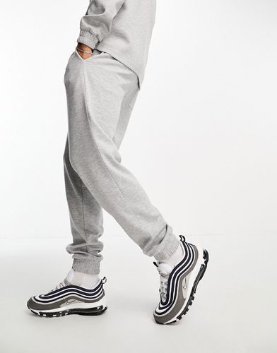 Pantalon de jogging fuselé habillé d'ensemble texturé - chiné - Asos Design - Modalova
