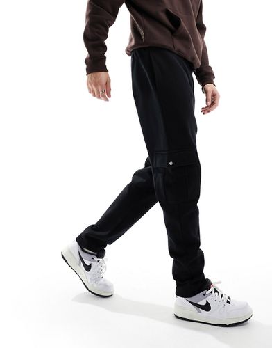 Pantalon de jogging fuselé oversize avec poches cargo - Asos Design - Modalova