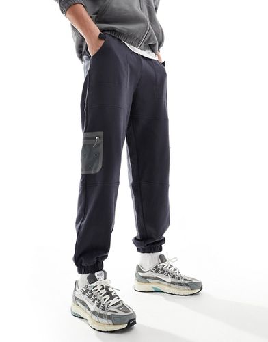 Pantalon de jogging oversize avec poches en mesh - Noir - Asos Design - Modalova