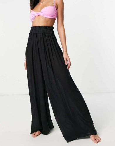 Pantalon de plage style palazzo coupe large froissée - Asos Design - Modalova