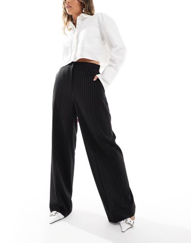 Pantalon de tailleur coupe dad ample à fines rayures - Asos Design - Modalova