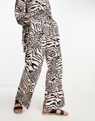 Pantalon d'ensemble à enfiler en lin imprimé animal - Asos Design - Modalova