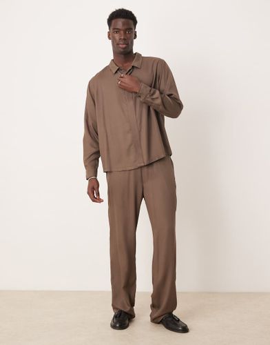 Pantalon d'ensemble baggy - Asos Design - Modalova