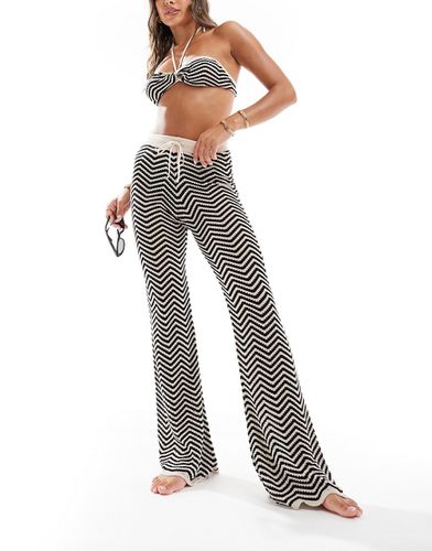 Pantalon d'ensemble de plage en maille à rayures - et blanc - Asos Design - Modalova