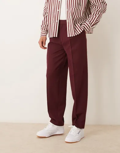 Pantalon habillé oversize coupe ajustée - Bordeaux - Asos Design - Modalova