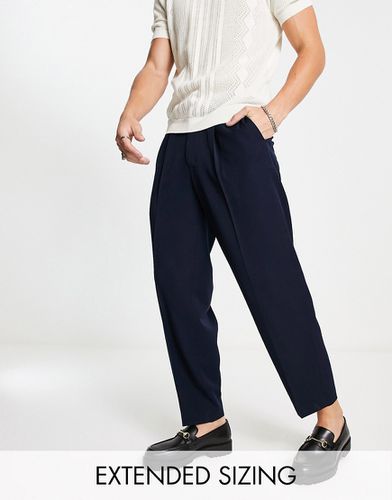 Pantalon habillé oversize fuselé - Noir - Asos Design - Modalova