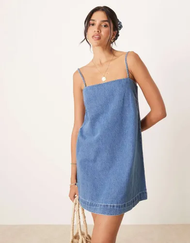 Robe caraco courte en jean - moyen dlav - Asos Design - Modalova