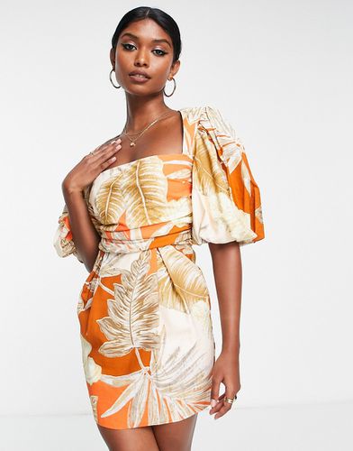 Robe courte à manches blousantes exagérées avec taille portefeuille et imprimé tropical palmiers - Asos Design - Modalova