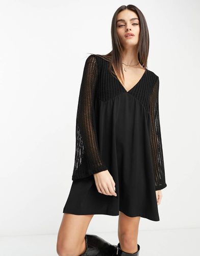 Robe courte en maille au crochet à manches longues et col en V - Asos Design - Modalova