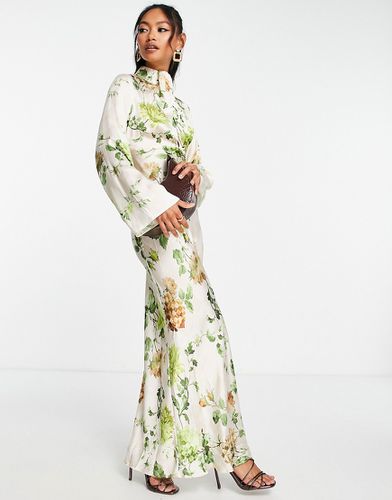 Robe longue coupe en biais à col montant effet torsadé et imprimé fleuri pixelisé - Asos Design - Modalova