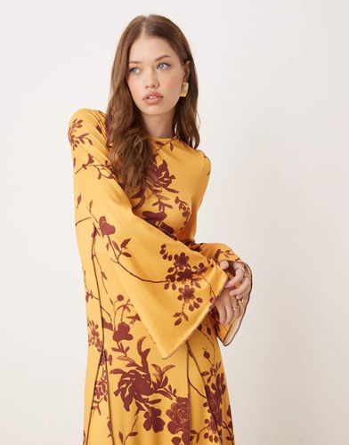 Robe longueur mollet à imprimé fleurs bohème - Pêche - Asos Design - Modalova