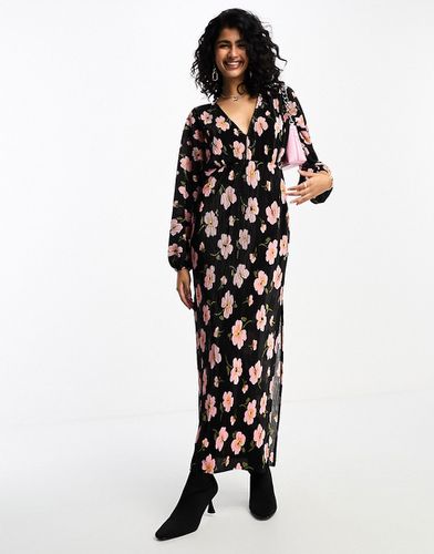 Robe mi-longue à fleurs avec manches chauve-souris longues et liens au dos - Noir et rose - Asos Design - Modalova