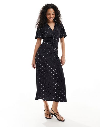 Robe mi-longue froncée devant avec imprimé à pois - Noir et blanc - Asos Design - Modalova