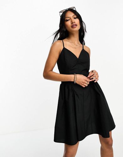 Robe patineuse courte en coton avec taille tombante - Asos Design - Modalova