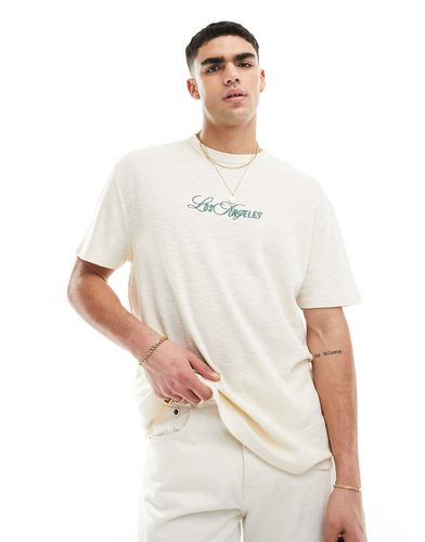T-shirt décontracté en tissu texturé avec imprimé ville sur la poitrine - Asos Design - Modalova