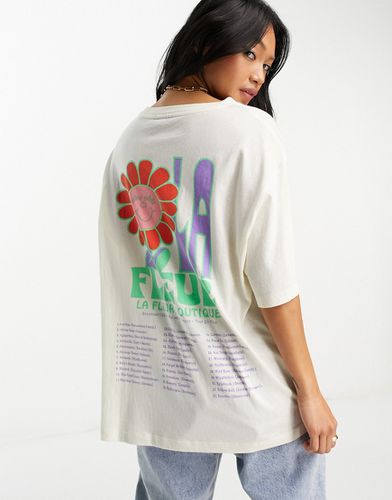 T-shirt oversize texturé avec motif fleur et inscription La Fleur » - Crème - Asos Design - Modalova