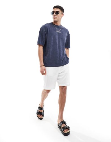 T-shirt oversize en tissu éponge avec texte brodé sur la poitrine - Bleu marine - Asos Design - Modalova