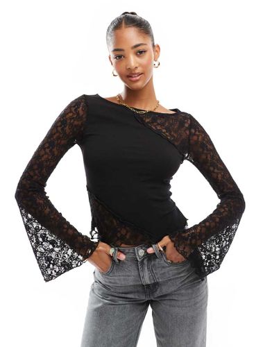 Top en dentelle avec manches ange et coutures apparentes - Noir - Asos Design - Modalova