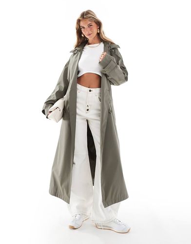 Trench à capuche en caoutchouc imperméable avec ceinture - Kaki - Asos Design - Modalova